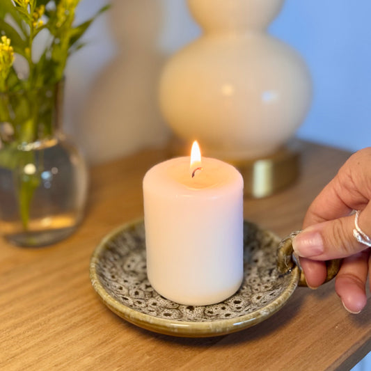 ceramic candle holder with a loop decorative